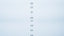 A precise vertical column of clear water droplets falling against a soft white-to-pale-blue background, suggesting rhythm and cycles