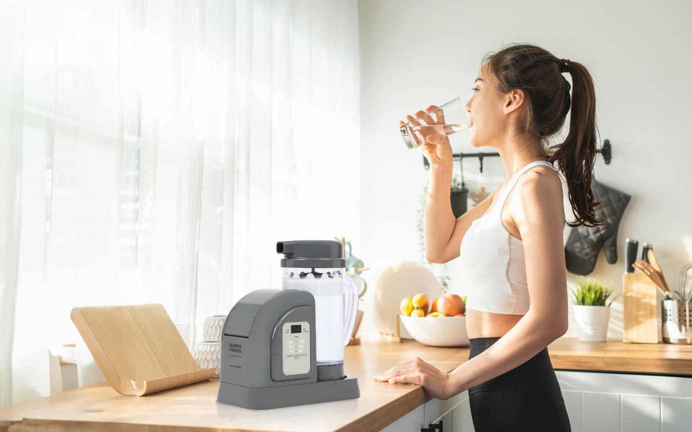 Woman drinking hydrogen water