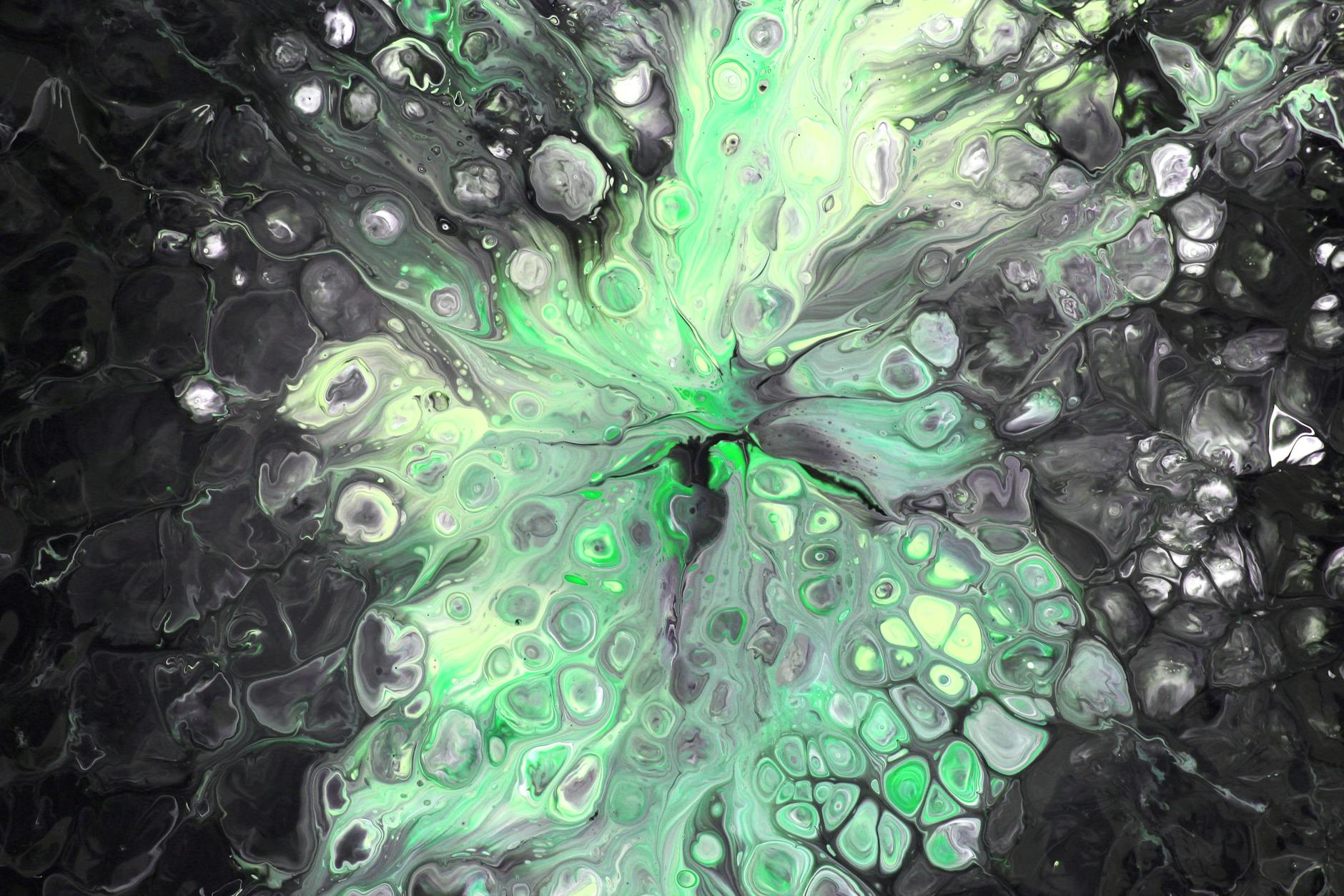 abstract fluid art with green and black hues