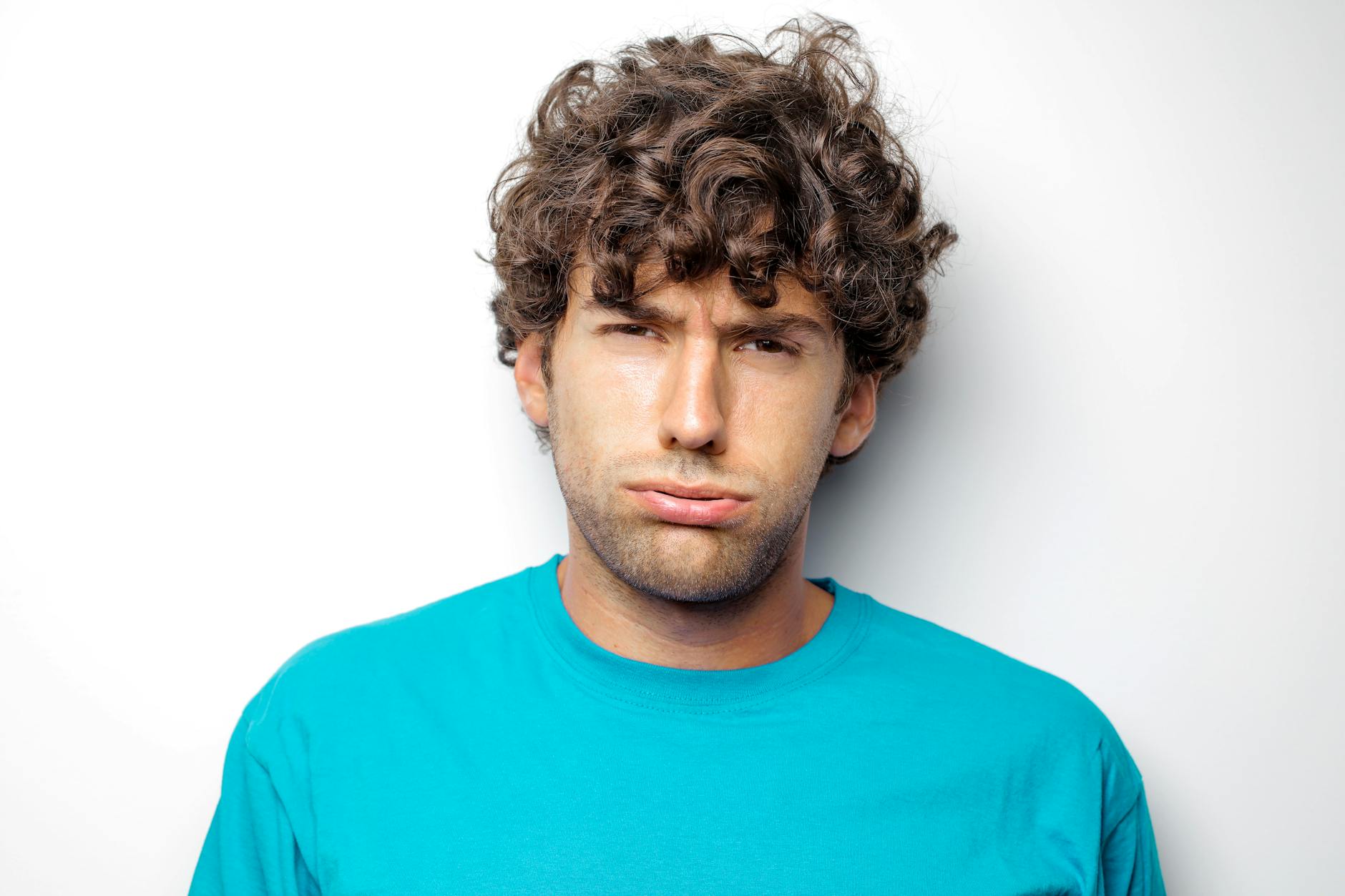 man in blue crew neck shirt